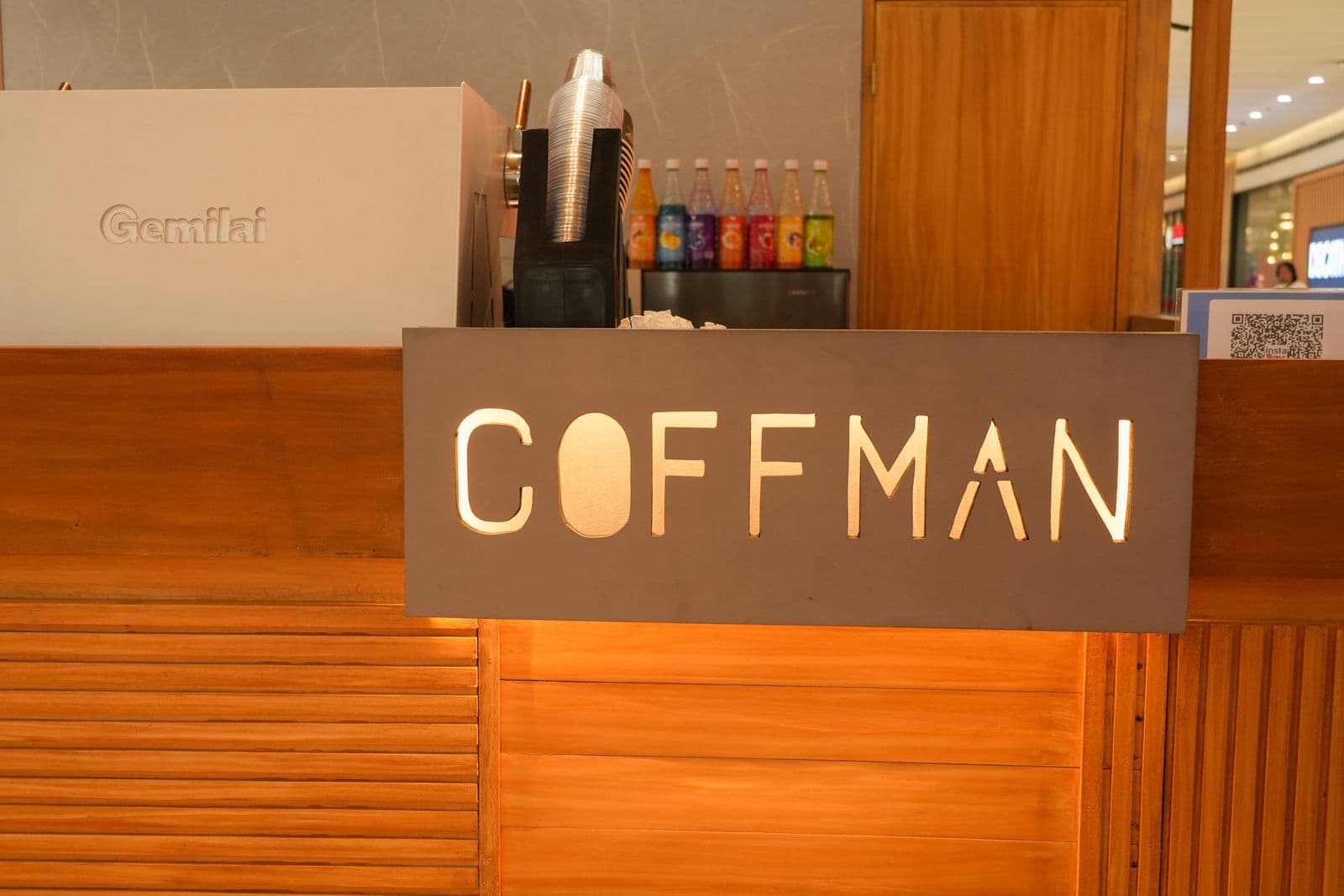 Close-up of custom timber cladding and wood slat details on Coffman Coffee kiosk
